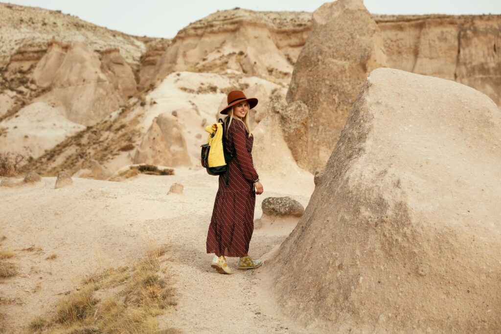 Travel backpacks for women come in many sizes, shapes and colours. Backpacking can be fashionable in the desert too.